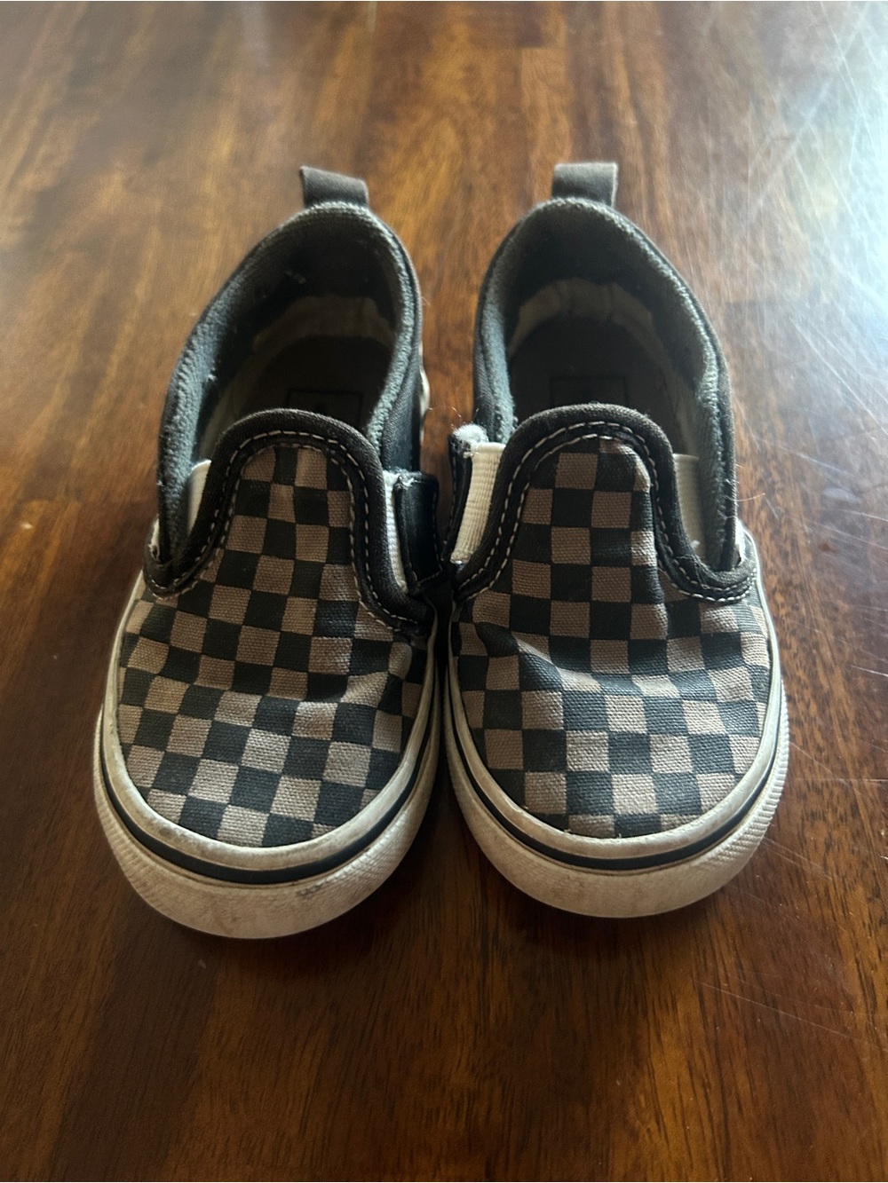 Vans Kids Checkerboard Slip-On Sneakers in Black and White